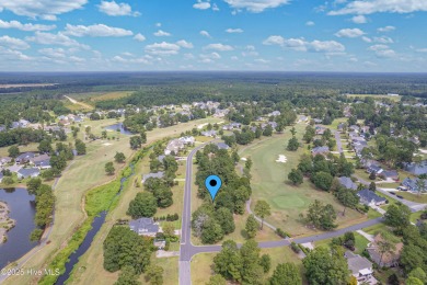 Build your dream home on this prime homesite in a premier golf on Brunswick Plantation and Golf Resorts in North Carolina - for sale on GolfHomes.com, golf home, golf lot