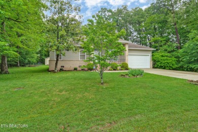 Check out this great home with beautiful views located right on Lake Tansi Village Country Club in Tennessee - for sale on GolfHomes.com, golf home, golf lot