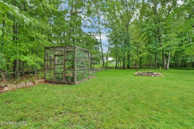 Check out this great home with beautiful views located right on Lake Tansi Village Country Club in Tennessee - for sale on GolfHomes.com, golf home, golf lot
