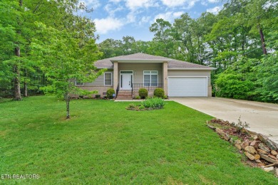 Check out this great home with beautiful views located right on Lake Tansi Village Country Club in Tennessee - for sale on GolfHomes.com, golf home, golf lot