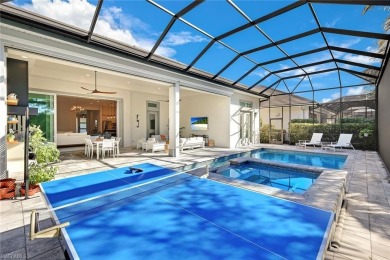 Discover this Beautiful Modern Elegant home in the exclusive on The Golf Club At Fiddlers Creek in Florida - for sale on GolfHomes.com, golf home, golf lot