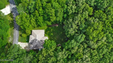 Check out this great home with beautiful views located right on Lake Tansi Village Country Club in Tennessee - for sale on GolfHomes.com, golf home, golf lot