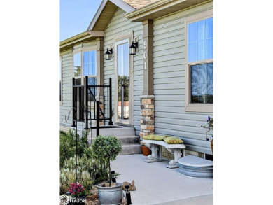 Discover a lifestyle of comfort and tranquility in this on Crestwood Hills Golf Course in Iowa - for sale on GolfHomes.com, golf home, golf lot