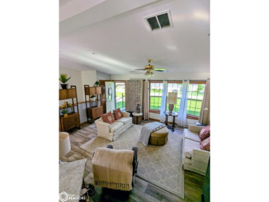 Discover a lifestyle of comfort and tranquility in this on Crestwood Hills Golf Course in Iowa - for sale on GolfHomes.com, golf home, golf lot