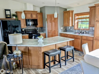 Discover a lifestyle of comfort and tranquility in this on Crestwood Hills Golf Course in Iowa - for sale on GolfHomes.com, golf home, golf lot