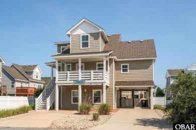 This turnkey 5-bedroom, 3.5-bath home is in the community of on The Currituck Golf Club in North Carolina - for sale on GolfHomes.com, golf home, golf lot