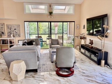 Discover the charm of this beautifully maintained 2-bedroom on Boca Pointe Country Club in Florida - for sale on GolfHomes.com, golf home, golf lot