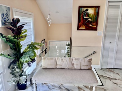 Discover the charm of this beautifully maintained 2-bedroom on Boca Pointe Country Club in Florida - for sale on GolfHomes.com, golf home, golf lot