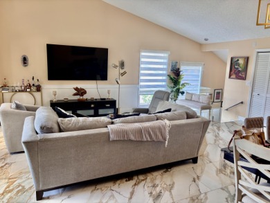 Discover the charm of this beautifully maintained 2-bedroom on Boca Pointe Country Club in Florida - for sale on GolfHomes.com, golf home, golf lot