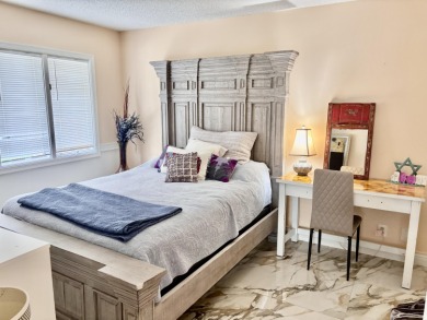 Discover the charm of this beautifully maintained 2-bedroom on Boca Pointe Country Club in Florida - for sale on GolfHomes.com, golf home, golf lot