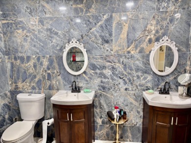 Discover the charm of this beautifully maintained 2-bedroom on Boca Pointe Country Club in Florida - for sale on GolfHomes.com, golf home, golf lot