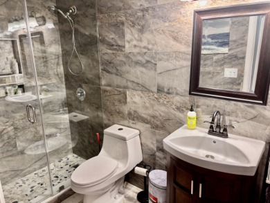 Discover the charm of this beautifully maintained 2-bedroom on Boca Pointe Country Club in Florida - for sale on GolfHomes.com, golf home, golf lot