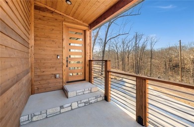 Welcome to a brand new, striking contemporary home! Thoughtfully on Branchwood Golf Course in Arkansas - for sale on GolfHomes.com, golf home, golf lot