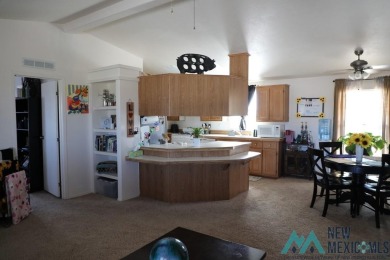 3-bedroom, 2-bath manufactured home on a large 0.67-acre lot in on Sierra Del Rio Golf Club in New Mexico - for sale on GolfHomes.com, golf home, golf lot