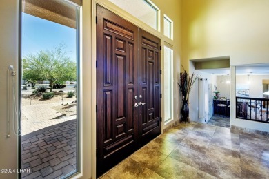 This Residential Estates home is directly on the 3rd fairway on London Bridge Golf Course in Arizona - for sale on GolfHomes.com, golf home, golf lot