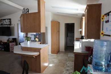 3-bedroom, 2-bath manufactured home on a large 0.67-acre lot in on Sierra Del Rio Golf Club in New Mexico - for sale on GolfHomes.com, golf home, golf lot