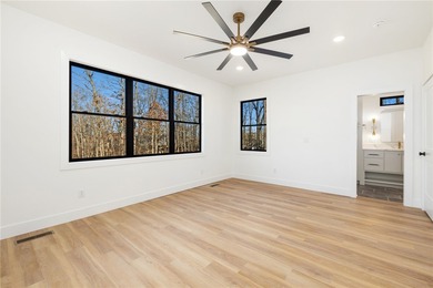 Welcome to a brand new, striking contemporary home! Thoughtfully on Branchwood Golf Course in Arkansas - for sale on GolfHomes.com, golf home, golf lot