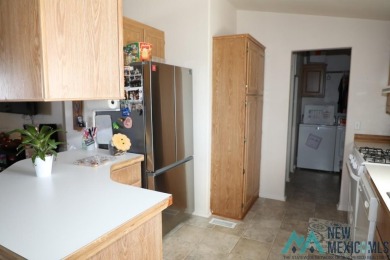 3-bedroom, 2-bath manufactured home on a large 0.67-acre lot in on Sierra Del Rio Golf Club in New Mexico - for sale on GolfHomes.com, golf home, golf lot