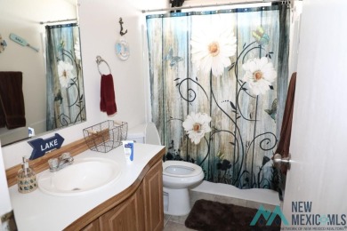 3-bedroom, 2-bath manufactured home on a large 0.67-acre lot in on Sierra Del Rio Golf Club in New Mexico - for sale on GolfHomes.com, golf home, golf lot