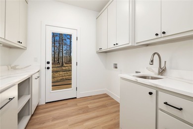 Welcome to a brand new, striking contemporary home! Thoughtfully on Branchwood Golf Course in Arkansas - for sale on GolfHomes.com, golf home, golf lot