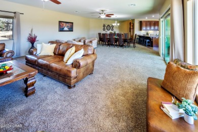 This Residential Estates home is directly on the 3rd fairway on London Bridge Golf Course in Arizona - for sale on GolfHomes.com, golf home, golf lot