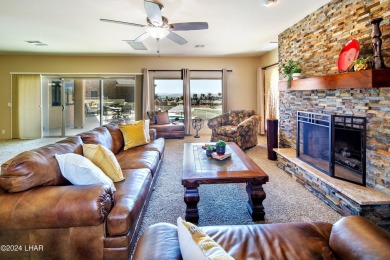 This Residential Estates home is directly on the 3rd fairway on London Bridge Golf Course in Arizona - for sale on GolfHomes.com, golf home, golf lot