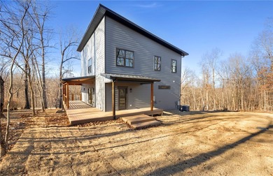 Welcome to a brand new, striking contemporary home! Thoughtfully on Branchwood Golf Course in Arkansas - for sale on GolfHomes.com, golf home, golf lot