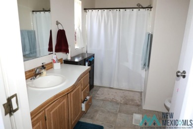 3-bedroom, 2-bath manufactured home on a large 0.67-acre lot in on Sierra Del Rio Golf Club in New Mexico - for sale on GolfHomes.com, golf home, golf lot