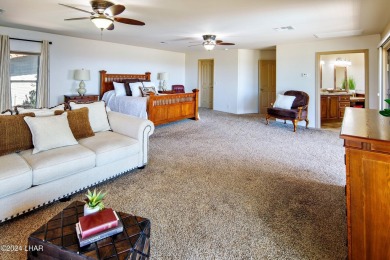 This Residential Estates home is directly on the 3rd fairway on London Bridge Golf Course in Arizona - for sale on GolfHomes.com, golf home, golf lot