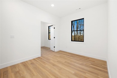 Welcome to a brand new, striking contemporary home! Thoughtfully on Branchwood Golf Course in Arkansas - for sale on GolfHomes.com, golf home, golf lot