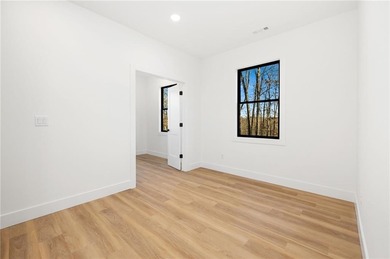 Welcome to a brand new, striking contemporary home! Thoughtfully on Branchwood Golf Course in Arkansas - for sale on GolfHomes.com, golf home, golf lot