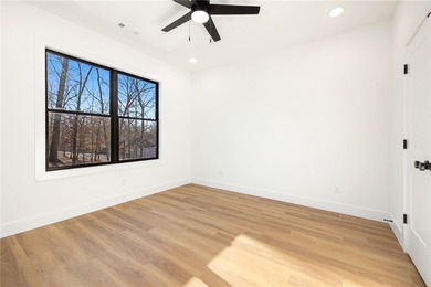 Welcome to a brand new, striking contemporary home! Thoughtfully on Branchwood Golf Course in Arkansas - for sale on GolfHomes.com, golf home, golf lot