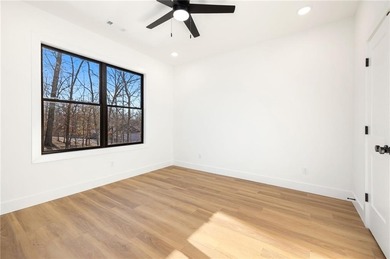 Welcome to a brand new, striking contemporary home! Thoughtfully on Branchwood Golf Course in Arkansas - for sale on GolfHomes.com, golf home, golf lot