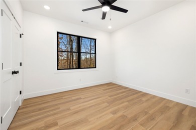 Welcome to a brand new, striking contemporary home! Thoughtfully on Branchwood Golf Course in Arkansas - for sale on GolfHomes.com, golf home, golf lot