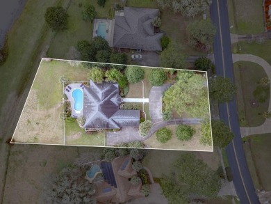 1-story all 4-sides brick pool home with beautiful views of the on The Golf Club At Summerbrooke in Florida - for sale on GolfHomes.com, golf home, golf lot