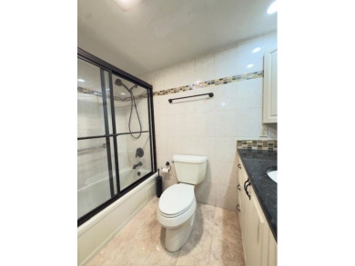Wonderful unit in exceptional well maintained building. Roof on Palm-Aire Country Club and Resort - Palms in Florida - for sale on GolfHomes.com, golf home, golf lot