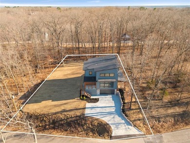 Welcome to a brand new, striking contemporary home! Thoughtfully on Branchwood Golf Course in Arkansas - for sale on GolfHomes.com, golf home, golf lot