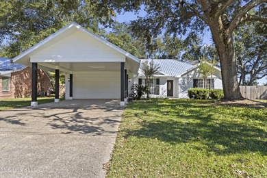 Welcome to this beautifully updated 3-bedroom, 2-bath home on Gulf Hills Golf Club in Mississippi - for sale on GolfHomes.com, golf home, golf lot