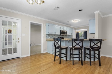 Welcome to this beautifully updated 3-bedroom, 2-bath home on Gulf Hills Golf Club in Mississippi - for sale on GolfHomes.com, golf home, golf lot