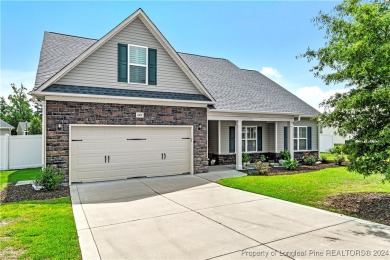 This inviting 4-bedroom, 2-bath home is nestled in PineCrest on Pinecrest Country Club in North Carolina - for sale on GolfHomes.com, golf home, golf lot