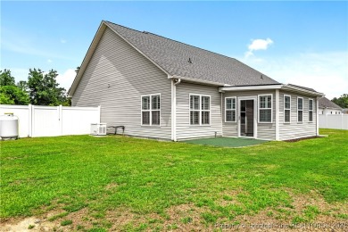 This inviting 4-bedroom, 2-bath home is nestled in PineCrest on Pinecrest Country Club in North Carolina - for sale on GolfHomes.com, golf home, golf lot