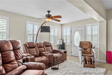 This inviting 4-bedroom, 2-bath home is nestled in PineCrest on Pinecrest Country Club in North Carolina - for sale on GolfHomes.com, golf home, golf lot