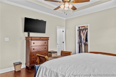 This inviting 4-bedroom, 2-bath home is nestled in PineCrest on Pinecrest Country Club in North Carolina - for sale on GolfHomes.com, golf home, golf lot