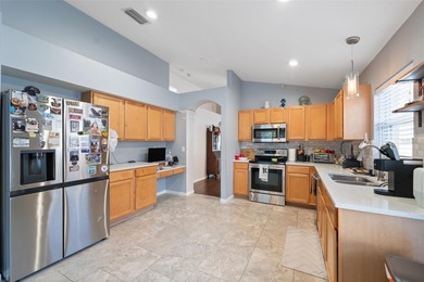 Discover this beautifully updated 4-bedroom, 2-bath home with a on Lexington Oaks Golf Club in Florida - for sale on GolfHomes.com, golf home, golf lot