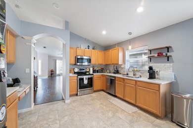 Discover this beautifully updated 4-bedroom, 2-bath home with a on Lexington Oaks Golf Club in Florida - for sale on GolfHomes.com, golf home, golf lot