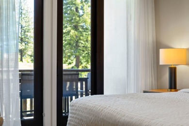 Discover mountain-modern luxury with this stunning 2-bedroom on Osprey Meadows at Tamarack Resort in Idaho - for sale on GolfHomes.com, golf home, golf lot