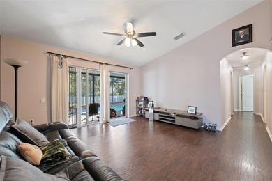 Discover this beautifully updated 4-bedroom, 2-bath home with a on Lexington Oaks Golf Club in Florida - for sale on GolfHomes.com, golf home, golf lot