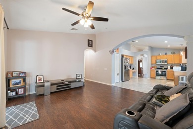 Discover this beautifully updated 4-bedroom, 2-bath home with a on Lexington Oaks Golf Club in Florida - for sale on GolfHomes.com, golf home, golf lot