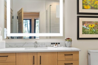 Discover mountain-modern luxury with this stunning 2-bedroom on Osprey Meadows at Tamarack Resort in Idaho - for sale on GolfHomes.com, golf home, golf lot