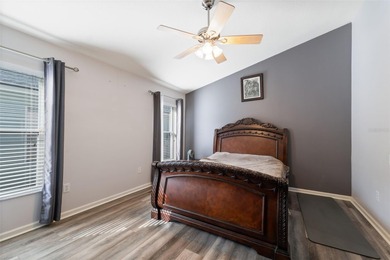 Discover this beautifully updated 4-bedroom, 2-bath home with a on Lexington Oaks Golf Club in Florida - for sale on GolfHomes.com, golf home, golf lot